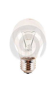 Obsolete uneconomical and unecological incandescent bulb with tungsten photo