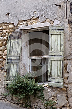 Obsolete window shutters in old city