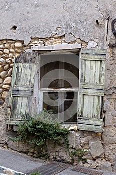 Obsolete window shutters in old city