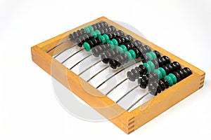 Obsolete wooden abacus on white background