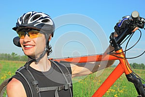 Obstinate cyclist with his bike