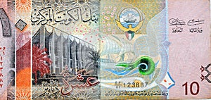 obverse side of 10 KWD ten Kuwaiti dinar bill banknote features The National Assembly of Kuwait, a sambuk dhow ship