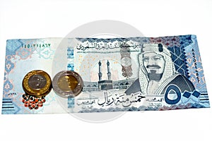 Obverse side of 500 SAR five hundred Saudi Arabia riyals cash money banknote features king AbdulAziz Al Saud and Kaaba with change