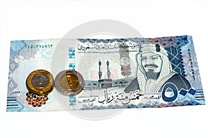 Obverse side of 500 SAR five hundred Saudi Arabia riyals cash money banknote features king AbdulAziz Al Saud and Kaaba with change