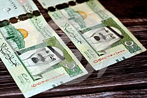 Obverse side of Saudi Arabia 50 SAR fifty Saudi riyals cash money banknote with the photo of king Abdullah Bin AbdulAziz