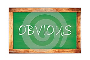 OBVIOUS text written on green school board