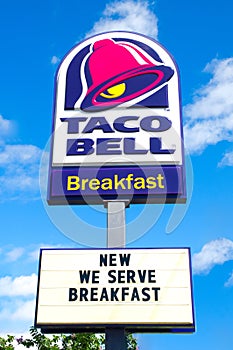 OCALA, FLORIDA USA, OCTOBER 14, 2023 Exterior road sign logo of Taco Bell American fast food chain restaurant we serve breakfast