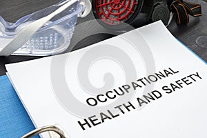 Occupational health and safety ohs act with the blue folder photo