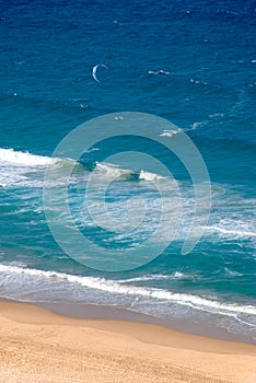 Ocean, Beach, and a parasurfer