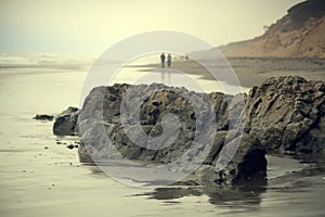 Ocean Beach in San Francisco at a Foggy Sunset.