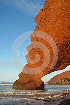 Ocean beach stone arch photo