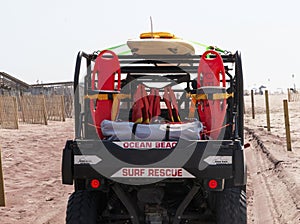 Ocean Beach Surf Rescue vehicle driving on the sand