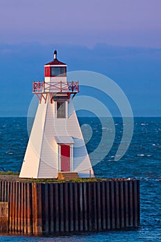 Ocean beacon at sunrise