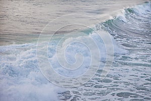 Ocean blue wave in ocean. Breaking wave for surfing in Bali.