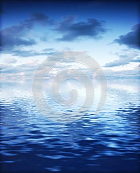 Ocean with calm waves background with dramatic sky