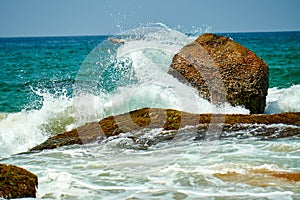 Ocean coast with big waves and rocks