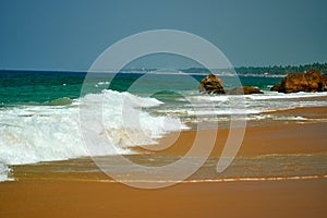 Ocean coast with big waves and rocks