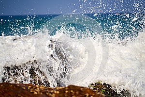 Ocean coast with big waves and rocks