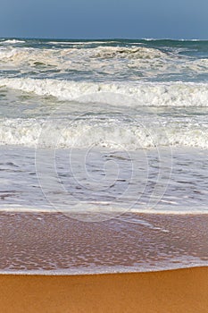Ocean coast, moviment waves with foam. Wind power. photo