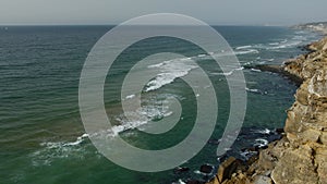 Ocean coast at sunset in Azenhas do Mar, Portugal, Colares area, near Sintra.