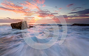 Turimetta rock flows from outer reef photo
