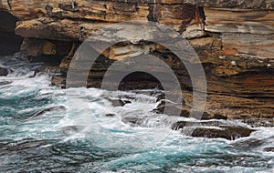 Ocean flows into sea caves