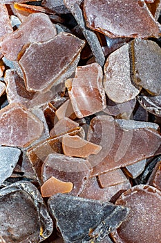 Ocean glass patterns on backgrounds with hands holding and grabbing, blues, whites, brown, green. Crafts