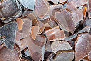 Ocean glass patterns on backgrounds with hands holding and grabbing, blues, whites, brown, green. Crafts