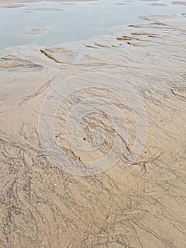 Pattern created by tide water on sand