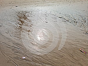 Pattern created by tide water on sand