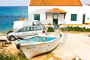 The ocean, the house and its residents vehicles