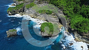 Ocean landscape with rocks, cliffs and ocean with waves in Hawaii. Aerial view