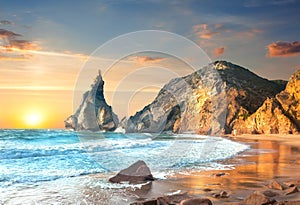 Ocean Landscape at Sundown, big rocks and stones beach