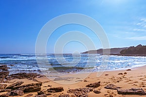 Ocean landscape wit beach and soft waves