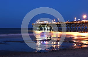 Ocean pier at night