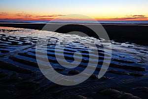 Ocean Ripples at Sunrise