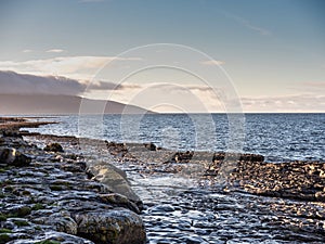 Ocean`s coast, Burren National park, Ireland, Galway bay, Blue water and sky