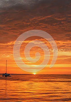 Ocean sea water. Sailing and yachting. Boat on water at sunset. Sailboats with sails.