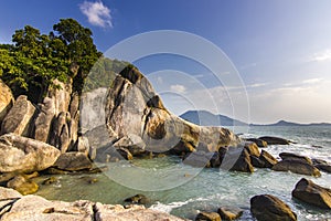 Ocean seashore with stone at sunrise in Samui island
