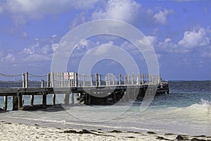 Ocean side dock on a tranquil sunny day. photo