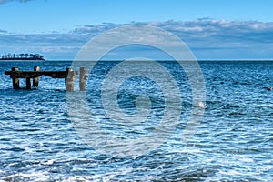 Ocean sky pier blue background