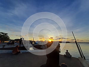 Ocean sunset ship cloud water