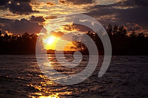 Ocean sunset or sunrise colorful horizon with beautiful sky, clouds and dawn sun