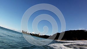 An Ocean Surfing Wave Breaks Over the Camera in Hawaii