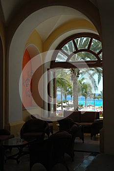 Ocean view through arched window in Cabo San Lucas, Mexico