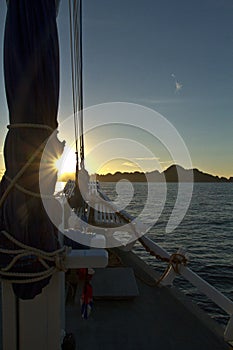 The ocean view from the bow of sailing ship on beautiful sunsets