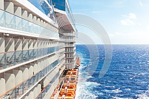 Ocean view from a cruise ship deck on a bright day