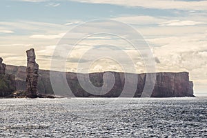 Ocean view of Old Man of Hoy, a tall sandstone stack at the coast between Stromness and Scrabster at Orknay in Scotland, Uk