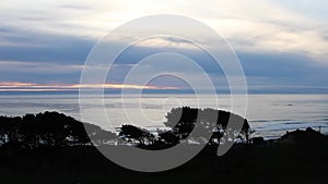 Ocean View With Overcast Sky And Trees