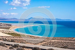 Ocean view poster. Blue water of lagoon and sand beach